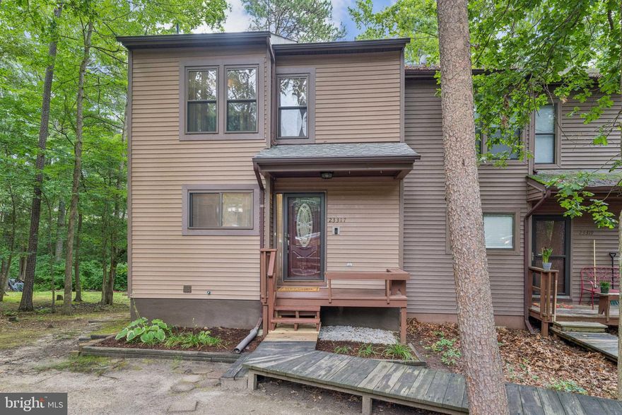 DON'T MISS OUT on this well-kept end-unit 3 BR/3.5 BA townhome in sought-after Wildewood community.  Minutes from PAX river NAS, shopping, restaurants, parks, and dining & entertaining in Solomons.  Tucked back on quiet cul-de-sac, home invites you in with hardwood flooring on main level, and features open flow with fireplace and deck to relax, cook out, and enjoy property backing to woods.   Lots of cabinet & counter space in kitchen with Whirlpool & GE appliances.  Three bedrooms upstairs, and primary suite features ceiling fan, oversized closet, and en-suite with shower/tub combo.  Walk-out basement is fully finished w/full BA & newer carpeting & Whirlpool HE Duet W/D.  Well-maintained and updates include new deck boards (2024), roof (2023), water heater (2019), heat pump/furnace (2018).  Enjoy neighborhood benefits of common grounds, fitness & walking trails, as well as opportunity for membership to community pool & gym. Two dedicated parking spaces & plenty of visitor parking. Come fall in love with your new home, and all that southern Maryland has to offer!