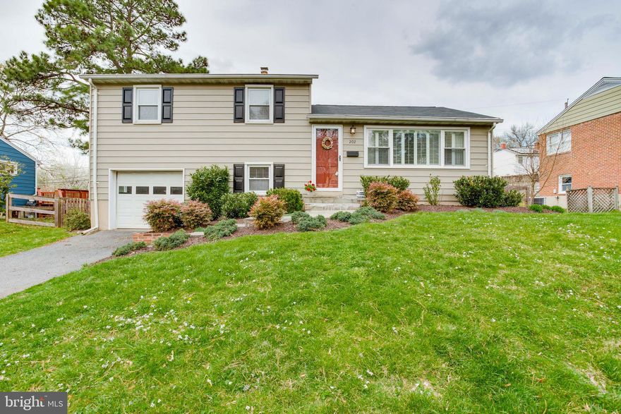 Wow.. This home is like out of a decorating magazine. Amazing open floor plan with newer kitchen, New Baths, MBR BATH IS A 10 +.Herring bone designed floor + marble shower. New Roof, Designer wide plank wood floors on 1st level. Access to fenced yd off Dining area. Custom plantation shutters add to the lovely bright LR. Like new completely finished 4th level w/new carpet-perfect for entertaining or play area or office space Additional family room off kitchen w/access to garage.Bedroom #3 presently used as custom walk-in closet-owner will convert back if requested. The home offers space, convenience+ a wonderful place to entertain and is turn key!!