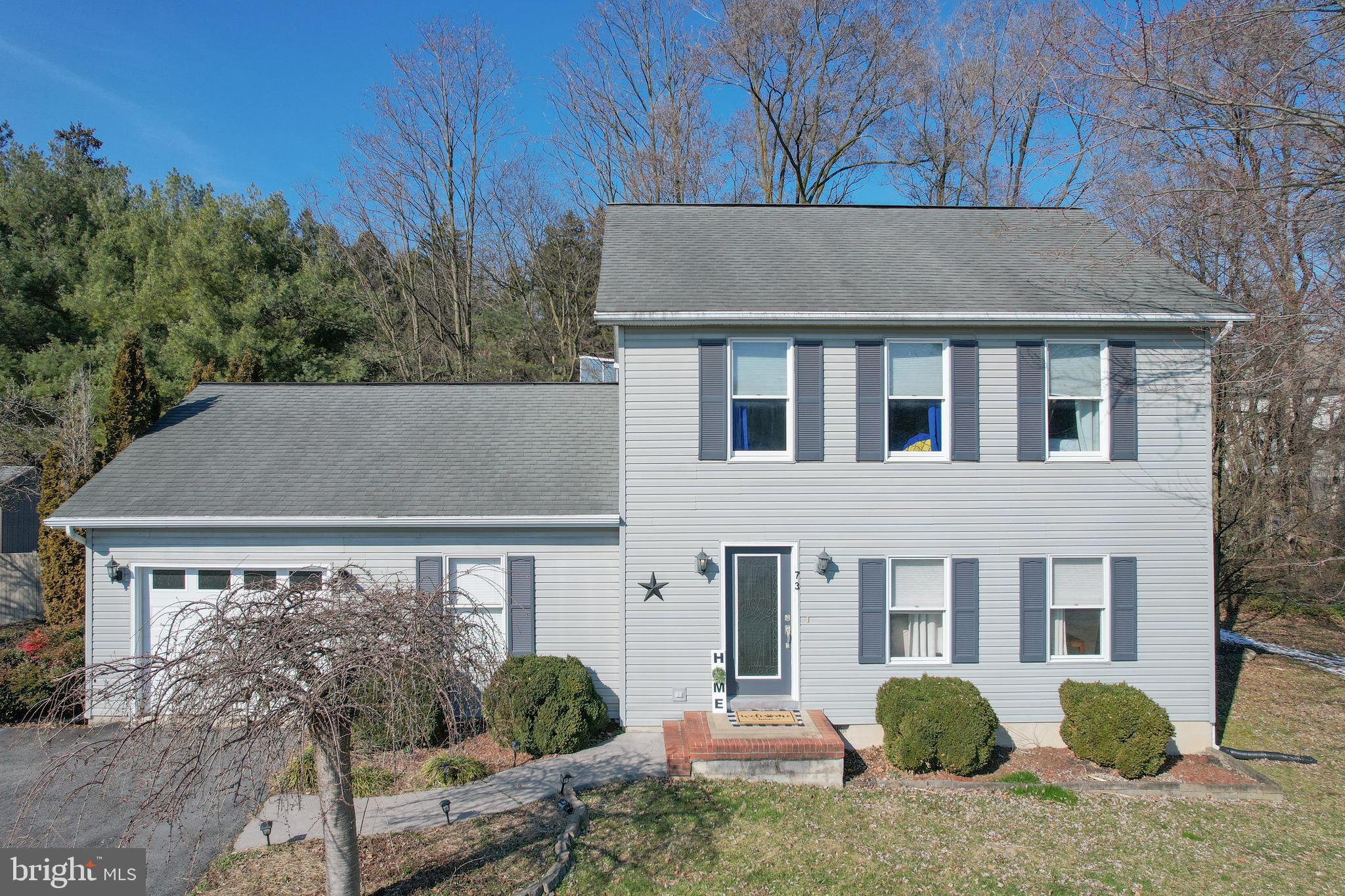 Say hello to your new home! Welcome to this perfectly appointed 3BR/2.5 BA home on a quiet cul-de-sac in rural, yet close to all amenities, downtown Hedgesville. A small community with a hearty welcome, you will appreciate the friendliness and value the privacy with a fully fenced, nearly half-acre backyard. Inside you have everything you need with a spacious kitchen with eat in island and offset dining room. You will appreciate the dining experience with views of the backyard through the sliding glass door or the gorgeous bay window with inset to sit a spell or decorate for your favorite festivities. The living room gives ample space to watch the game, read a book and cozy up in your favorite blanket. The garage walks in to a large mudroom/ flex room currently designed as an office. On the main level, the laundry room is out of sight and tucked away with it's own door from the flex room. Upstairs, the floor plan is well situated to accommodate two bedrooms with spacious closets. Both have nice windows and varying sunlight through the day. The primary ensuite includes a large bedroom with a tiled, stand-up shower and vanity bathroom. The backyard is magical and nearly a half acre. It is a great space to garden, escape, relax and play. The wooden shed is perfect for your outdoor implements and activity needs. Hedgesville is a growing community with so much to love, come check out 73 Stockade Court and see what all the fuss is about. Book your showing today.