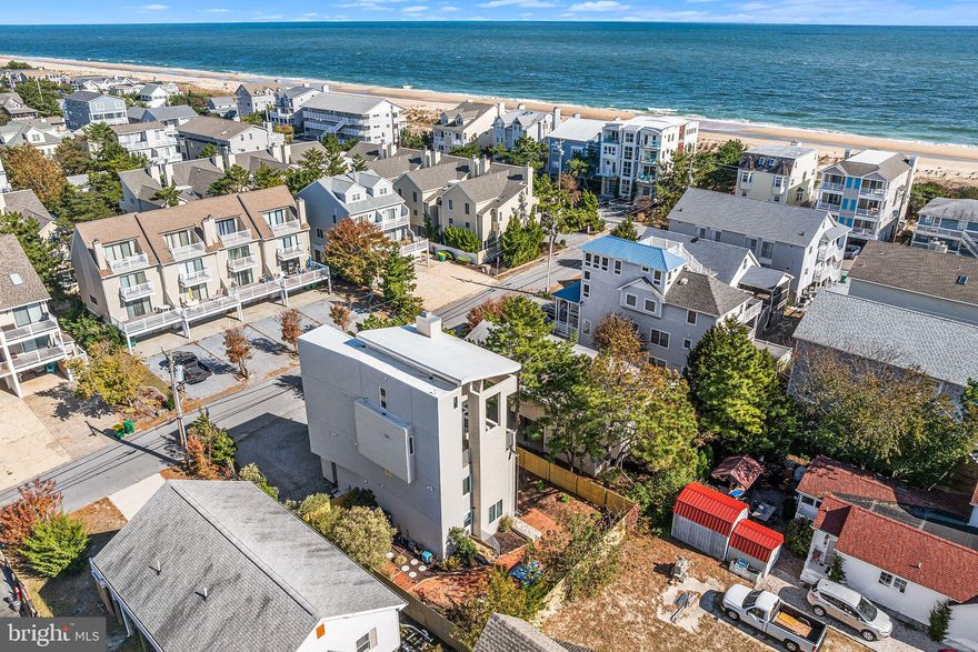 The Iconic “Shiphouse” – A Fenwick Island Landmark

A true Fenwick Island icon, the “Shiphouse” stands as a one-of-a-kind architectural treasure—featured in Architectural Magazine for its distinctive coastal design.
The ground level offers a self-contained 2-bedroom, 1-bath apartment complete with its own kitchen, living area, washer/dryer and a private rear entrance. An interior ship’s ladder connects this space to the main residence, allowing for flexibility as a private suite or part of the whole house.
Upstairs, three more levels unfold with creativity and charm. The main living area features an open-concept layout with a gourmet kitchen, dining area, and family room anchored by a cozy fireplace. Multiple balconies and porches invite you to savor sea breezes, sunrises, and the relaxed Fenwick Island lifestyle.
Set on spacious grounds with ample parking and a backyard perfect for outdoor enjoyment, this home combines comfort, versatility, and coastal character. Conveniently located just steps away from the beach, the home features an outside shower and powder room to make the most of every beach day. With a timeless appeal, the “Shiphouse” is ideal as a family retreat.

Don’t miss this rare opportunity to own a piece of Fenwick Island history!