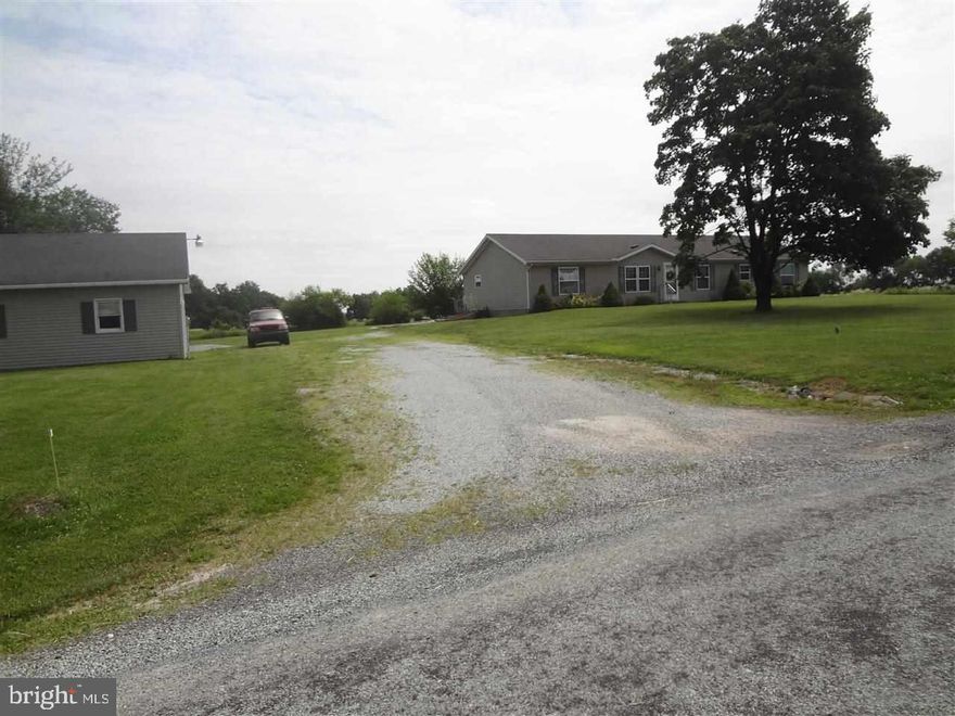 Wonderful country setting, charming rancher, 3 BRs, 2 full BAs, Spacious eat-in kitchen plus formal dining room, living room has gas fireplace, finished family room, country living at it's finest!