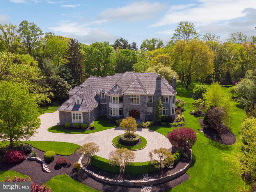 Don't miss this rare opportunity to own the home everyone admires when they pass by, the jewel of the neighborhood, 951 Idlewild Road! This magnificent property in prime Gladwyne, built by C.F. Holloway in 1999, was reinvented by the original owners who added an in-ground pool, purchased & combined the adjacent land, and completely renovated the estate to the highest standards. Boasting an extremely private setting, the remarkable 9,600 sf residence with 6 bedrooms & 7.2 baths now sits on 2.77 fully fenced, lushly landscaped acres. The curb appeal is enhanced by an entire facade of real stone, beautiful paver & circular drive, and added covered porch with automatic screens. The gorgeous interior was meticulously reconfigured into a wonderful open-concept layout, designed for entertaining intimate groups & large parties, with top-of-the-line finishes at every turn. It is truly beyond compare, featuring 5  walnut floors, high-quality custom millwork & cabinetry, Lutron lighting, Sonos music & other fine details throughout. For today s discerning family, there are so many ways to enjoy this awe-inspiring yet comfortable house, whether entertaining friends in the formal living & dining spaces, sitting by the fire in the living room, having coffee in the gourmet kitchen s Miele coffee center, hosting a barbecue on the outdoor patio, reading a book in a quiet corner, or cheering on your favorite team in the fabulous basement. Light pours in from abundant windows on all sides, showcasing lovely property views. Culinary perfection is made in the premium showstopper kitchen that satisfies the most demanding chef, graced by 100+-year-old ceiling beams, custom cabinetry, huge dual islands & state-of-the-art appliances. The sun-bathed breakfast area opens to the rear outdoor patio oasis, and the incredible family room with wood beams, a fireplace flanked by built-in cabinetry with display glass & built-in wet bar. The divine vaulted section of the family room is brightened by skylights, picture windows & French doors also leading outside. Among the many other highlights of this immaculate beauty is a private den, deluxe master suite, graciously-proportioned family/guest bedrooms, spa-quality bath & incredible lower level with a 1000+ bottle wine cellar, exercise room with an adjacent steam shower bath, dog bath plus every amenity for an incomparable lifestyle. The phenomenal fenced-in pool with a patio & relaxing spa provides the ultimate resort-style pleasure.