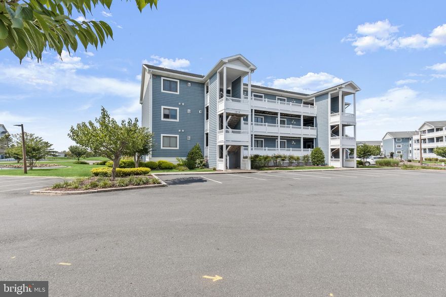 Welcome to the Harbour Club of Ocean City, Maryland, where luxury and waterfront living converge. This stunning condo offers the perfect blend of comfort and convenience. With two bedrooms, two full baths, and a boat slip, this residence is a haven for those who appreciate coastal living at its finest. As you step inside, you are greeted by an open and inviting atmosphere. The open kitchen, dining, and living room create a seamless flow, making it ideal for entertaining guests or enjoying quality time with friends and family. The kitchen is equipped with ample countertop space, and a breakfast bar, perfect for preparing delicious meals while engaging in conversation with loved ones. The spacious living room provides a cozy retreat, with its comfortable seating and a large sliding glass door that allows natural light to flood the space, creating an airy and bright ambiance. The dining area seamlessly connects the living room and kitchen, making it easy to transition from meals to relaxing evenings. One of the highlights of this condo is the large rear deck, which offers a tranquil outdoor space. Whether you prefer basking in the sun or seeking shade, the partially covered deck provides the flexibility to cater to your preferences. The condo features two well-appointed bedrooms, offering privacy and comfort. The primary bedroom boasts an ensuite bathroom while the second bedroom has direct access to the second full bath, ensuring convenience for both residents and guests. Additionally, this condo comes with a coveted boat slip, allowing you to explore the beautiful waterways of Ocean City with ease. Whether you enjoy boating, fishing, or simply cruising along the coast, this amenity adds another layer of enjoyment to your waterfront lifestyle. Located in the prestigious Harbour Club, residents of this condo have access to a range of community amenities, including a swimming pool, fitness center, and clubhouse, enhancing the overall living experience.