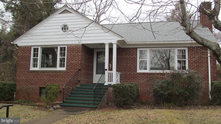 Perfect starter home with 2 bedrooms, 1 bathroom,  fireplace in the living room/ dining area, screened-in porch off the kitchen that overlooks a private backyard, and the laundry and utilities are located in the unfinished basement giving you multiple possibilities. Improvements:  New Roof,  freshly painted inside and out, the hardwood floors have just been refinished, new vinyl flooring in the bathroom and kitchen, new ceiling fan in the living room, and a new, leased above-ground oil tank replaced the in-ground tank that was properly removed. Inspections are welcome for informational purposes only; however, the property is being sold as-Is.