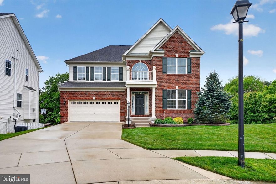 Better than new * Premium location backing to wooded common area * Bright and open floorplan * 9' ceilings on the main level * Cooks' Kitchen with 42" cabinets, granite counters and high end appliances * Gleaming hardwood flooring * Maintenance free deck with retractable awning * Owners suite features tray ceiling and attached luxury bathroom * Lower level finished with large Recreation Room and walkout *