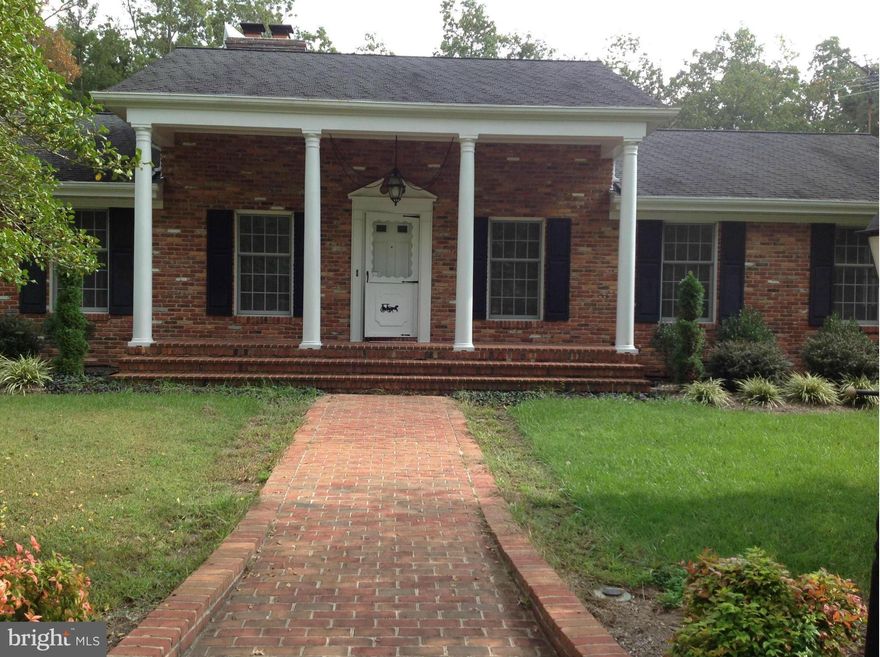 Beautiful Brick Rambler on 6 acres in La Plata! Spacious formal and informal living room, separate dining room, large bedrooms, updated master bathroom, hardwood floors throughout the entire house, 2 car garage , fenced in backyard, detached office/Studio, shed/work barn, along with front yard wooded privacy. No Town Taxes