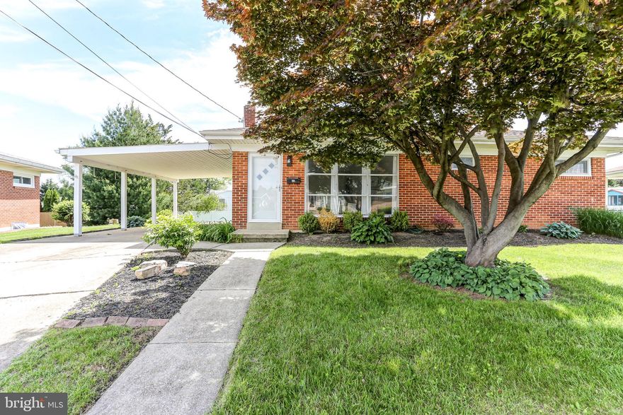 Discover this delightful ranch home nestled in sought-after Hampden Township. Boasting hardwood floors throughout the spacious Living Room and three generous bedrooms, enjoy the comfort of single story living.
The updated full bathroom features a modern walk-in shower, pedestal sink, and handsome tile flooring. The kitchen, equipped with newer vinyl flooring, presents an opportunity for customization to suit your personal taste.  The expansive basement includes a workroom and laundry area and provides ample space for a craftsperson or home fitness enthusiast. The level yard, with plenty of natural light, is perfect for the avid gardener, while the convenient carport and driveway offer ample parking. Efficient natural gas forced air heat and gas hot water heater, too!Located near the dining and shopping options along the Carlisle Pike and with easy access to major highways, this home is tucked away in a nice neighborhood. Residents also enjoy proximity to Hampden Township Park, which offers a variety of recreational amenities, and the Hampden Township Pool, providing a refreshing retreat during warmer months. Don't miss out on this wonderful opportunity—schedule your showing today!