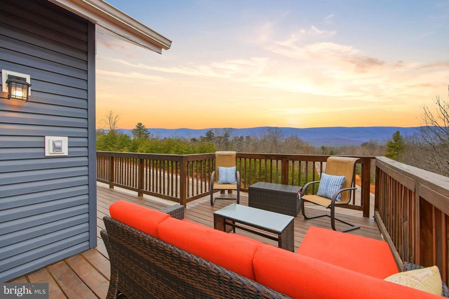 VIEWS! VIEWS! VIEWS! Built in 2021, this 1,920 sqft incredibly clean and modern mountain home feels almost brand new thanks to meticulous care and maintenance. The main level offers a bright, open living space designed to take full advantage of the stunning mountain views which are visible from both inside and out. The bright kitchen features stainless steel appliances and white cabinets.  The kitchen sink is located in the island and faces into the living room creating a great vibe for entertaining.  The kitchen flows seamlessly into the main living/dining area, creating an inviting space for everyday living or entertaining. This part of the main level has gorgeous vaulted ceilings and a wood burning fireplace. This level also includes two generously sized bedrooms, both furnished with king beds, along with a full bathroom and a convenient half bath. Thoughtful design, clean lines, and tasteful furnishings throughout give the home a fresh, move-in-ready feel.
The lower level provides additional living space with a second family room and dry bar area which is perfect for relaxing or hosting guests. This level features two large bedrooms, including one with a king bed and another furnished with a full and a twin bed, offering flexible sleeping arrangements. A full bathroom and a dedicated laundry area complete the lower level. Like the main level, the lower level enjoys beautiful mountain views. This makes every level of the home feel open and connected to the outside.
Beautiful upper and lower decks are perfect for taking in the scenery, enjoying morning coffee, or unwinding at sunset. The property is not part of an HOA, offering added freedom and flexibility. Located less than a mile from Bryce Resort, and close to two popular restaurants, a local ice cream shop, and the driving range, this home combines convenience with a true mountain retreat feel. This is truly a turn-key property and comes furnished. Schedule your showing today!-