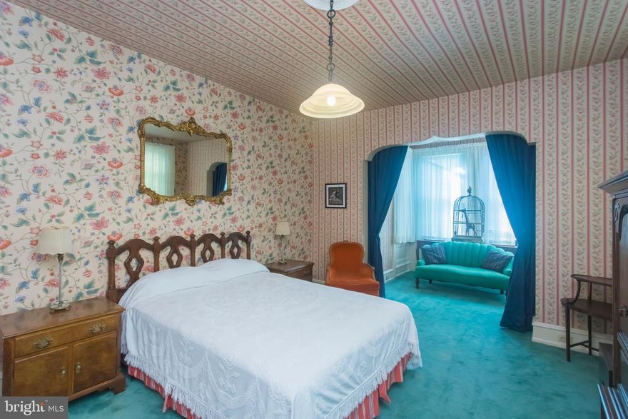 Original details throughout this large home off Passyunk Square with 4 large bedrooms and 2.5 baths. The  foyer features original multi color tiles with original foyer door with original banister stairs. The home features extremely tall ceilings throughout! The living room sits  off to the right of the foyer with original marble mantel, hardwood underneath carpet throughout, large dining room is off the large U shaped kitchen and back "gravy room" off kitchen with another full kitchen.  The back 2nd floor bedroom features an original sun room, radiator heat throughout, access to the roof from the third floor passage as well. This home features the best of the old and is lovely as is on a great street in Sunny South Philly! Walkable to the italian market, passyunk square dining, close to grocery stores, a butcher shop, wine store and many more amenities.