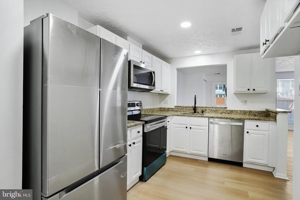 Photo of 19804 Larentia Drive, GERMANTOWN, MD 20874 (MLS # MDMC2202672)