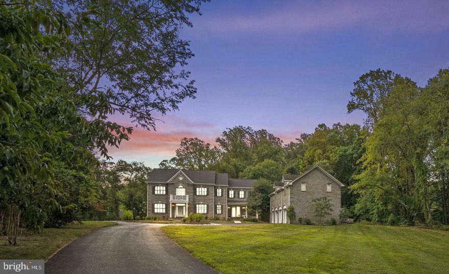 Welcome Home to Luxurious Country Living in Great Falls

Step into your dream home, an exquisite property that embodies the perfect blend of luxury and comfort. This impeccable custom home, completed in 2021, sits on a private 2+ acre lot, offering unparalleled living. The estate includes a stunning Main House, plus detached Carriage House, 4-car garage, and separate Barn/Workshop.

A Custom family home, offering 6 Beds, 7 and 1 half Baths, by Builder Magazine’s 2021 Builder of the Year!

Main House: A Masterpiece of Craftsmanship
As you enter the Main House, you'll be greeted by a sense of grandeur. 10-foot ceilings, wide-plank hardwood floors, crown moldings, and impeccable trim work create an ambiance of sophistication and elegance. Plantation shutters adorn the windows for perfect light control and privacy.

The main level features formal living and dining rooms, a home office, and a family room with a two-sided fireplace. Dual staircases lead to the upper level, for easy access to four spacious bedrooms, each with its own ensuite bathroom and walk-in closet. For added convenience, there's a hallway laundry room.

The heart of the home lies in the all-white Chef's Kitchen, equipped with top-of-the-line stainless steel appliances, a Miele coffee station, Monogram professional appliances, and dual range with electric oven. A custom Tennessee Walnut Island and daylight pantry offer ample storage. The kitchen flows into bright, open living space with rows of windows and recessed lights.

Step outside the kitchen onto the custom-designed, covered terrace with Montauk slate surfaces, and a built-in grill—ideal for entertaining.

The Primary Bedroom suite is an oasis of tranquility, with an adjacent sitting area and large daylight walk-in closet. The Primary Bath is equally luxurious, featuring a skylight, a custom glass shower, a separate soaking tub, his-and-her vanities, and enclosed water closet.

The lower level offers 9-foot ceilings, a finished 1,000 sq ft recreation room, full bath, and Guest Room. Plus, over 1,000 sq ft of storage space.

In total, the Main House has 5 bedrooms and 5.5 bathrooms.

The property, tucked in on picturesque Springvale Road, includes a long circular driveway for abundant parking. The back patio overlooks a private wooded area, with the potential to add a pool, and is situated on a designated bird sanctuary.

The property is serviced by FiOS high-speed internet, and the home features a whole-house Wi-Fi system.

Carriage House: 
The estate includes a detached Carriage House, renovated in 2011, offering a 1,200 sq ft open-concept apartment with 1 bedroom, 1.5 baths, full kitchen, pantry, office, laundry facilities, and hardwood floors. The apartment meets Fairfax County standards for a legal rental. The carriage house also boasts a 4-car garage with a 220V outlet, ready for the installation of an electric car charging station.

Barn/Workshop: Versatile Space
A large workshop/barn with new roof and gutters, electricity, and water is located at the rear of the property. This space can accommodate cars, serve as a workshop, or a horse barn.

New Well & Septic: 
The property includes a New Well and Septic System, added in 2021.

Location: Ideal Accessibility
This exceptional property enjoys an unbeatable location within the highly regarded Langley High School pyramid. It's also conveniently close to Great Falls Village, Tysons, Reston, and major commuter routes, and offers a wealth of recreational activities.

RESNET, Affordability Sheet, and Builder's Warranty:
The property comes with a RESNET Energy Smart Home rating 69% greater efficiency than older resale homes.  The Builder's Warranty will transfer to the buyer, and an Affordability Sheet is provided by the owners.

In conclusion, this extraordinary Great Falls property offers an unparalleled living experience, combining luxury, comfort, and endless possibilities for modern family living.

Accepting Back up Offers