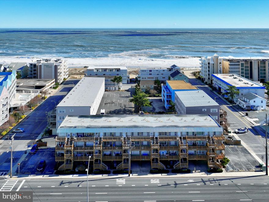Come see this upgraded one bedroom, one bath condo that is freshly painted and features new laminate flooring. Beach living is easy just one flight up with in this condo with spacious bedroom, inviting kitchen, full bath with tub/shower & linen closet, and a deck for al fresco enjoyment. Located in Midtown Ocean City directly across from the Convention Center . This one won't last long! Just a short walk to the beach, on the ocean side of Coastal Hwy and walking distance to mini-golf, Seacrets and the 45th Street Tap House. Shopping, the Boardwalk and entertainment are just minutes away. Offered fully furnished this unit makes a great vacation home or rental investment.