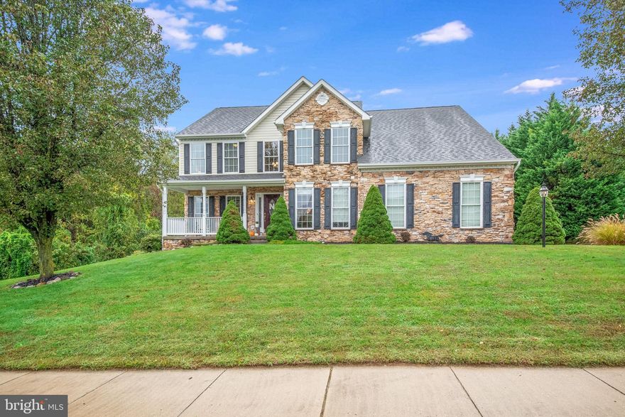 If you have been looking for the WOW house then this would be it!  Absolutely beautiful with updates throughout. Foyer and kitchen flooring has been updated to porcelain tile. Updated kitchen includes high grade custom cabinets, back splash, granite countertop and center island.  All appliances are stainless steel including refrigerator, microwave, dishwasher and stove.  Oversized 2 car side load garage. Just bring the furniture because all appliances will convey with the home.  Your family room opens onto the kitchen and includes a stone stack gas fireplace with mantel and hearth. The property is a true 4 bedroom with all bedrooms located upstairs.   Primary bedroom is an en suite with a bedroom sized walk in closet.  During warmer weather you will enjoy the professionally installed paver patio with a wonderful view of your level backyard.  There are so many features in this home, I cannot list them all here.  Please see this home in person, you will not regret the time spent looking at your new home!