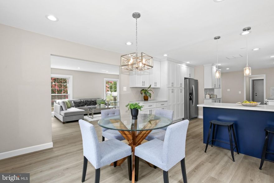 Newly renovated, this three-story detached home graces the PROVIDENCE community. 
The upper two levels have undergone a comprehensive transformation. 
The main level features an expansive and well-lit living room, along with a family room featuring a welcoming fireplace. The open kitchen showcases pristine quartz countertops, modern stainless-steel appliances, and fresh cabinetry. Connecting seamlessly, the dining room flows into both the kitchen and living room. A convenient powder room is also located on this main floor.
Both The kitchen and main floor laundry room have doors to an expansive screened deck spanning two levels. 
Ascending to the upper level, discover four bedrooms and two full baths. The primary suite boasts a dual-sink bathroom with a standing shower, while the shared hallway bathroom serves the remaining three bedrooms, complete with its own double sink and bathtub. All bathrooms have been meticulously updated with new tiles, vanities, toilets, faucets, mirrors, and light fixtures.
The upper two levels have been fully revitalized with fresh coats of paint, new flooring, and contemporary light fixtures throughout. 
The fully finished basement offers a capacious entertainment area, perfect for gatherings and leisure. It also encompasses a generously-sized storage room complete with shelving for organization. Furthermore, a convenient walk-up staircase provides access to the stunning backyard.
The home's exterior is adorned with captivating landscaping, having earned the esteemed Best Garden Award in Fairfax City under the previous owner's care. Nestled within the community is a warm and inviting atmosphere. Residents remain connected through a neighborhood email group, ensuring everyone is well-informed about local and citywide events. Engaging activities such as chili cook-offs, Fourth of July BBQs, Halloween parades, Easter egg hunts, and a Holiday Cookie exchange stand as highlights. Notably, the community is pet-friendly and boasts a tranquil absence of through traffic, contributing to its remarkably pleasant ambiance.
This exceptional living environment is set in the splendid City of Fairfax, renowned for its top-tier schools, diverse shopping options, vibrant entertainment scene, an abundance of dining choices, and thriving breweries. Seamlessly connected to major commuting routes, the location offers easy access to downtown Fairfax and the esteemed George Mason University.