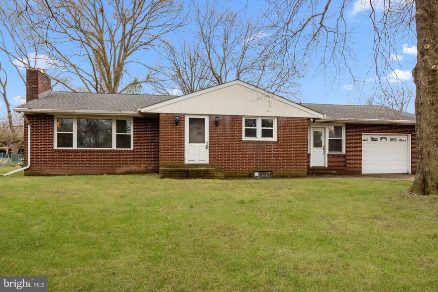 Full brick ranch house with GAS heat in Pennsbury Schools! This home features a great one floor lifestyle living with 3 bedrooms, and 1.5 bath ( half bath is in the primary bedroom) Solid Hardwood floors throughout! Kitchen needs updating but breezeway is extra living space and a huge house perk, as well as a full basement, and a one car garage. Mostly all new windows and doors, except just a few!Big open lot with plenty of room to enhance your backyard or expand this home. Priced to present upgrades that are needed. The price is a starting suggestion.
