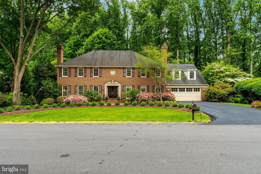 Timberly, an enclave of 50 brick homes on expansive, private lots surrounded by mature trees in a park-like setting. Timberly is located just outside the beltway in close proximity to downtown McLean, the heart of Tysons corner, and only minutes from the Silver Line Metro. Timberly also has access to parkland and walking trails that take you to adjoining neighborhoods, Spring Hill Rec Center, plygrnds, & sprts flds. This community's neighbors take pride in their neighbrhd.  They have an online & printed neighbrhd directory to promote community interaction.
This charming all brck center-hall Colonial will  welcme you w/ its exquisite lndscping and circular drivwy.  Home was built by Ken Seidel, Stratton Construction (1976) & is beautifully sited on over a .50 lot that is almost perfectly square.  Deck overlooks a very prvte & quiet settng.  Beyond the prprty is Tmbrly Prk, a Fx Cnty Prk w/ a meandering stream.  Residnce has over 5000 fished sqr ft of living space on 3 lvls that has been meticulously maintained by the ognal owners.  Hrdwd flrs are on almost the entire main fr (excpt the Ktchn, lndry rm, & pwdr rm).   Hrdwd flrs throughout the uppr ll (excpt a small section of the Sitting Rm, 3 bthrms up & the bonus rm) & in the LL Rec Rm & Game Rm.  
The marble-floored foyer is open to the main staircase & flnked by the Livng Rm on the left & the FR on the right. The LR has a natural wd brning firplce w/ mrble hearth & detailed moldings.  Just off the Lvng Rm at the far end is a lovely formal Office w/ an entire wall of built-in bookcases & files.  Also off the Lvng Rm is the frmal Ding Rm w/ detailed molding & a window/dr wall allowing views of the incredible bckyrd. The Dinng Rm leads into the large gourmet Ktchn. Ktchn has 12x12 ceramic tile, Ktchen Aid appliances that include a 48” Fnch panel refrigerator w/ access to the ice & water outside the dr.  Kitchen also has a Thermador 5 burner dwndrft cktop w/ a snless-stl pot filler in the backsplash. Features in this lovly ktchen are the heated flr, ht water dispenser by the under mounted double sink w/ garbage dspsal for each of the sinks.    Kitchen also includes a U-line wine refrig, built-in microwave, & a lrge brkfst rm w/ wall mounted TV which conveys. Brkfast area leads to the Lndry Rm, which is off the garage & includes a rear staircse to the bonus rm above the garge. Landy m has a GE washer & dryr w/ a utility sink w/ ample built-ins for strge. Off laundry rm is the lrge 2 car garge w/ built-in cabinetry & a profesnlly installed, extmely durable epoxy flr.  To the right of the foyer is a lovely Famly Rm w/ an all brick, floor to ceiling wood burning firplce that has been convrtd to gas & a granite wet bar area.
The rear stairs in the Laundry Rm conveniently accesses the upsrs Bonus Rm abve the garge.   Pass through the Bons Rm via a secret dr concted to one of the walk-in closts in the Primry Bedrm. Once you’re up to the Uppr Lvl, the Primry Ste area is expanve w/ a Sitting Rm that may be convrted bck to an addtinal bedrm upstars, en-suite luxry Primry Bathrm, his & her walk-in closts, two vanitis, a framlss extra-lrge glss shwer, an upgradd theraptic soaking tub, a privte water closet commde area & a lrge linen closet. Rest of the uppr lvl includs an additinal 2 full hll bths w/ privte tub & commde areas & 3 additional bedrooms, 1 of them having a full-size walk-in closet.
Lowr levl offers a lrge Rec Rm w/ an all-brick natural burnng wd firpce that has been converted to gas & an entire wall of custom built-ins bkcass.  Adjacent to the Rec Rm is a lrge Gme Rm that also incldes a full wlk out to the surreal bckyrd & patios. On the lower levl is a second kitchen th at was grandfatered in & apprvd by Fx Cnty.  The kitchen was updated w/ grnite cntertps, GE rnge, dshwsher, under mnted snk w/ grbage disposl, & a GE refrigerator. Additinal legal 5th bdrm w/ a walk-in closet & a full bth, as well as an unfinshed spce w/ a trmendous amnt of storage, built-in shelving .