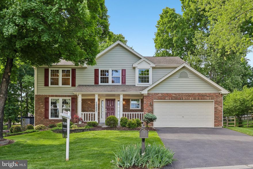 Welcome home to 11457 Settlers Landing Way, a stately home perfectly nestled on a quiet, tree-lined street in the heart of North Potomac. Boasting a beautifully manicured lot and a charming, covered front porch, this home offers the ideal blend of comfortable living and excellent location. Step off the inviting front porch and inside to a bright, welcoming foyer that flows seamlessly into the formal living and dining rooms featuring gleaming hardwood floors. The heart of the home is the kitchen with space for a full sized table and access to the patio. The kitchen opens directly into a cozy family room anchored by a beautiful wood-burning fireplace - the ideal entertaining space. Upstairs, you’ll find a spacious and serene owner's suite complete with a walk-in closet and a luxurious en-suite bathroom. Three additional generously sized bedrooms with ample closet space complete the upper level. The basement offers a fantastic opportunity to create your own recreation space, an additional bedroom, or office area. Love the outdoors? Step out from the main level onto a spacious patio overlooking a  shaded backyard full of mature mature trees—perfect for summer barbecues or seamless indoor-outdoor entertaining. Located in the highly sought-after Dufief Mill neighborhood, this home is minutes away from scenic trails, neighborhood parks, and premier shopping and dining at Traville Village Center, Fallsgrove, Downtown Crown, Kentlands, and the Rio. A walkable mile  away to Stonebridge Elementary school, the adjacent neighborhood pool, multiple day care centers, Big Pines park, county bus stops, and the North Potomac Community Center. Commuters will love the easy access to I-270, I-370, and the Shady Grove Metro. Schedule a showing today!