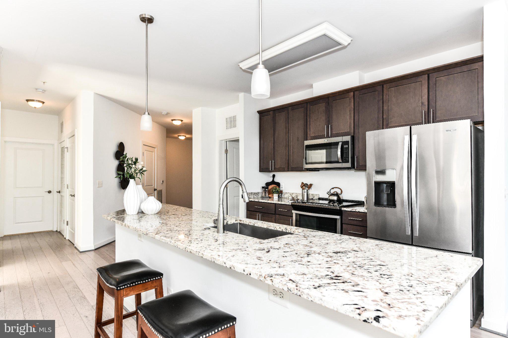 9430 SILVER KING COURT 103