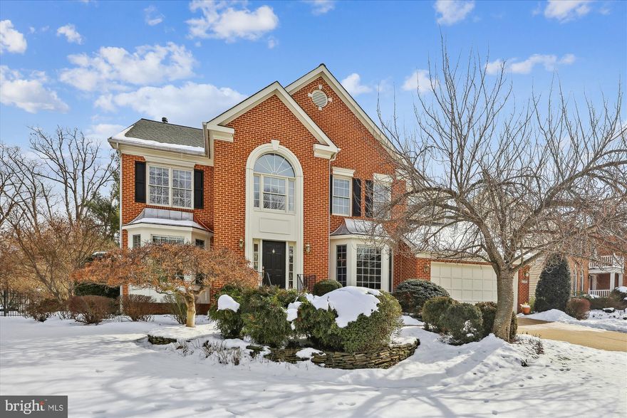 Regal Oaks is the perfect name for a small community of elegant homes in a quiet, private setting that is convenient to Tysons, DC, Mosaic, Metro and more.
This home stands majestically on 1/3 acre that is framed with lush landscaping. Pride of ownership is evident throughout the home.
From the inviting foyer one can see the lovely living room and spacious dining room. The kitchen, with its octagonal island, has all the beauty of a carefully remodeled kitchen that opens to a deck, screened porch and patio providing the ideal spot for barbecuing, relaxation and entertaining. A convenient office and comfortable family room with a fireplace add to the appeal of this home. An elegant powder room completes the main level.
The upper level features four bedrooms with new carpeting and three updated bathrooms. The large primary suite includes a sitting area for reading or morning exercises.
The lower level has been masterfully finished with kitchen facilities, a wet bar, a fireplace, full bedroom and full bath. Perfect for guests, extended family or a live-in nanny or caretaker.