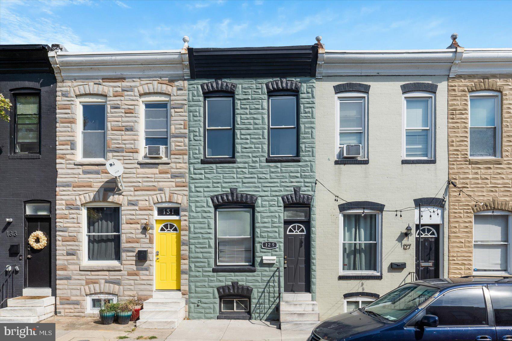 Beautiful renovation, just 2 blocks from Patterson Park, that offers what everyone wants in Baltimore City Living - A ROOFTOP DECK. Huge deck with 360 degrees views of Patterson Park and the city. This 2 Bedroom 1.5 bath home features custom details including Tray Ceilings and Wainscoting through out the first floor. Hardwood floors with an Open floor plan leads you to your new Kitchen featuring granite counters, black appliances and plenty of cabinet space. Brand new Luxury vinyl flooring installed in the Kitchen and second floor. Big, back yard with privacy fence that is perfect for cookouts and entertaining. City Living at its very Best! Ask about possible Seller help with closing costs.
