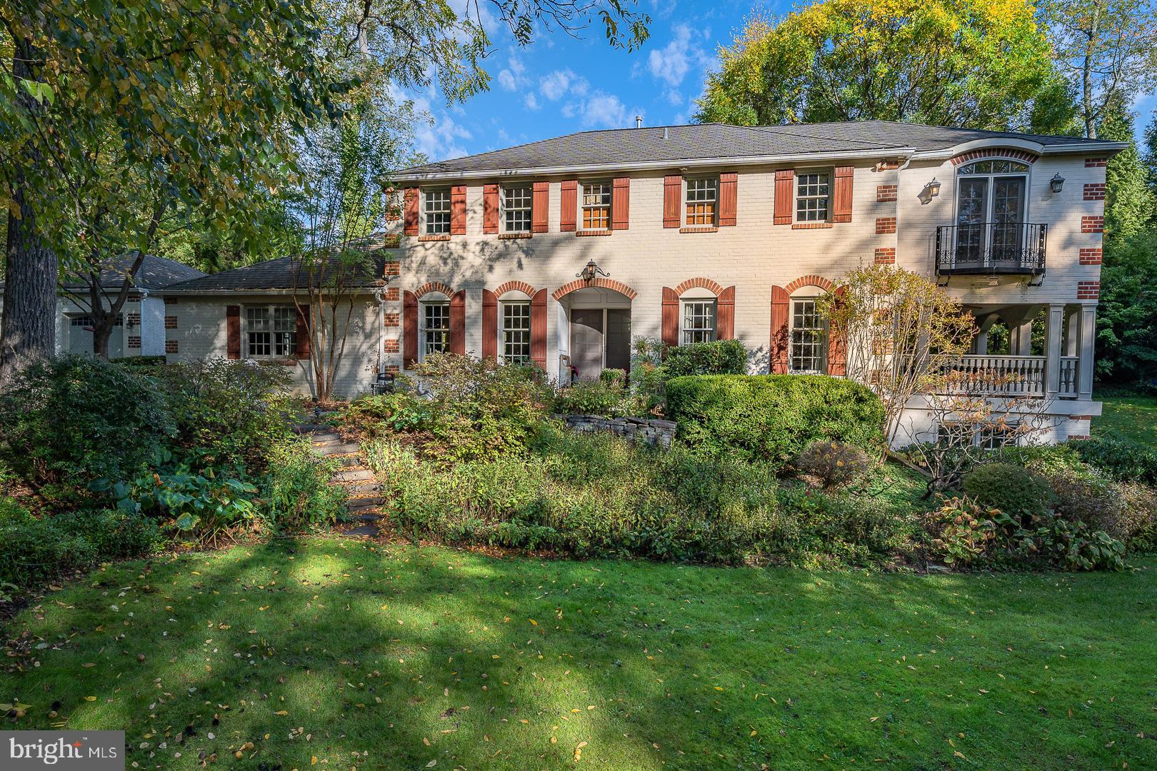 Beautifully renovated home in a bulcolic setting and walkable to downtown Wayne!
A double wide front door invites you into the first floor of this home, which has an expansive floor plan perfect for all living and entertaining needs. The open eat-in kitchen with granite countertops and stainless appliances with plenty of cabinet and countertop space is every chefs dream, with gorgeous, private views of mature landscaping and nature outside. Located next to the kitchen is a large family room with high ceilings, propane fireplace, along with an sizeable mudroom and direct access to the backyard stone patio through sliding doors
Also on the first floor is a generously sized dining room with floor to ceiling windows, office with french pocket doors and access to a beautiful and large covered porch. Also included on the first floor is a library space and powder room.
On the second floor of the home, there are three nicely sized bedrooms with ample closet space, a hallway bathroom and large laundry room. The primary suite includes hardwood flooring, tray ceiling, custom window treatments and a massive dressing room/area. The primary bathroom has a large tub, as well as a shower, and double sink vanity, and a towel warming drawer.
The large finished walkout basement includes a gym, full bathroom, large flex/entertaining space and a bedroom with sliding doors and windows.
Additional features include two car garage, large driveway, small decorative pond, and many outside areas to relax and entertain. Located in Radnor Township School District and walkable to downtown Wayne, Cowan Park as well as convenient to public transportation.