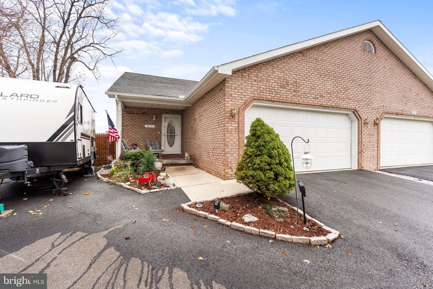 ***ASSUMABLE  2.75% INTEREST RATE!!*** Welcome Home to 18757 Mesa Terrace! These units don't come available often, not to mention one with as many unique features as this home! The property features a custom 60-foot extended driveway, wide enough to fit a 20+ foot camper/RV and a 40' fifth wheel. The RV Parking also has full hookups(Electric, Water, Sewer) The 2-car garage further extends the extent of parking availability. The lot is particularly unique, being the ONLY lot in this development that borders an outcropping of mature trees on one side, adding a level of seclusion. Speaking of seclusion, this lot is the last one on Mesa Terrace - A dead-end-street. No Thru-Traffic here! The stained wood-picket privacy fence tops it off.  Stepping inside, the upgrades feature upgraded EnergySTAR stainless-steel appliances, newer granite countertops w/backsplash , 5-year-old heat-pump HVAC Unit, and upgraded plank flooring. Oven features a convection feature. The seller maintains a transferable home-warranty on the property, that will pass to the new owner! An architecturally shingled roof adds to the property's longevity and quality construction. This community has NO HOA, and is outside of city limits, adding to the affordable nature of owning this home! The seller has an FHA loan that may be assumable - Call for details. Don't wait! This one won't last long! Call today to schedule your private tour!