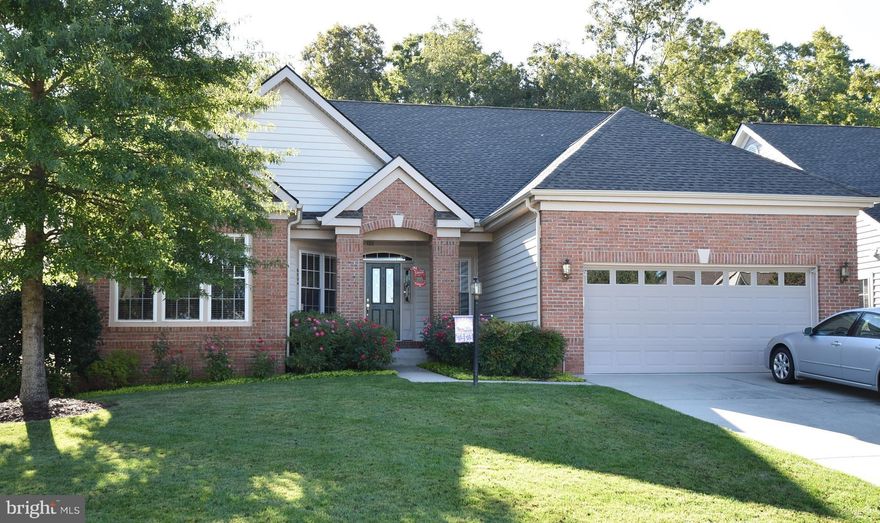 Lovely 3 finished level Cedar III located in 55+ community of Heritage Hunt* Backs to heavy trees on privately owned land*main level open floor plan w 2 sided fireplace*Master bedroom on main level plus another bedroom*upper level w loft, 2 more bedrooms and bath*Lower finished level with bedroom/office/and huge rec room plus another full bath*Huge price reduction just taken!!