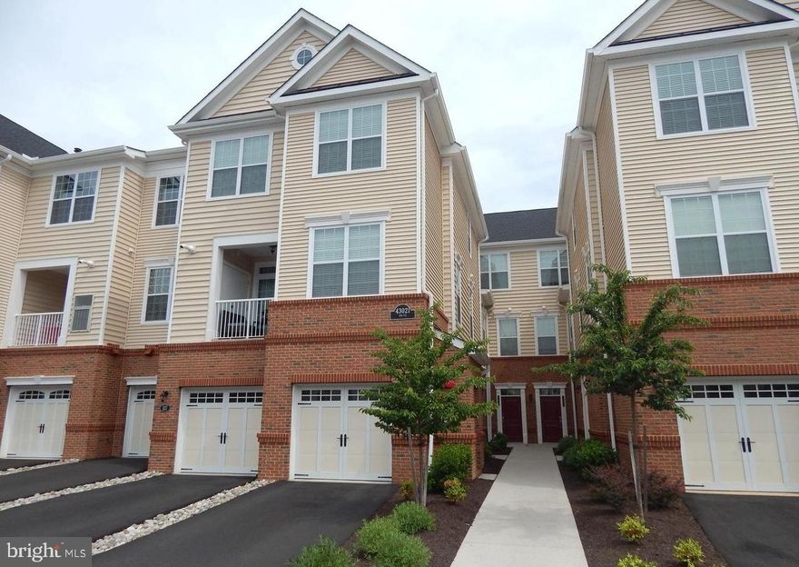 Modern 2019 built single level, dual primary bedroom condo in Ashburn. 1,004sqft living space with a cozy floorplan, granite, tile, and hardwood flooring.  Upgraded GE Profile stainless steel appliances. Kitchen includes large center island, generous cabinet space, and gas stove with griddle. First primary bedroom has ample closet space and well-appointed bathroom featuring a large vanity. Second primary bedroom offers a spacious closet and full bath. Additional highlights include a centrally located washer/dryer and desirable covered patio backing to grassy area. Quiet neighborhood with walking access to Clubhouse w/ Fitness Center, 3 Community Pools, trails, parks & playground. Unit has an assigned parking space and plentiful guest parking. Non-smoking; pets welcome with refundable pet deposit + $50 pet rent per pet (restrictions may apply). $55 application fee for screening (credit & background check), utilities not included; online rent pay available. Conveniently located off Loudoun County Parkway, minutes from Rt. 50, Dulles Greenway and Silver Line Metro. Move-in ready, available immediately.