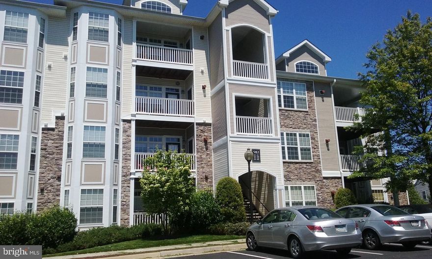 Splendid condominium--beautifully appointed with lovely hardwoods through main living areas;  open kitchen, attractive architectural features including crown molding, foyer with display shelf and arched ass thru to living room.   Alcove to bedroom and bath.   Kitchen features granite counters plus stainless steel appliances.  Balcony.   Available for occupancy August 15