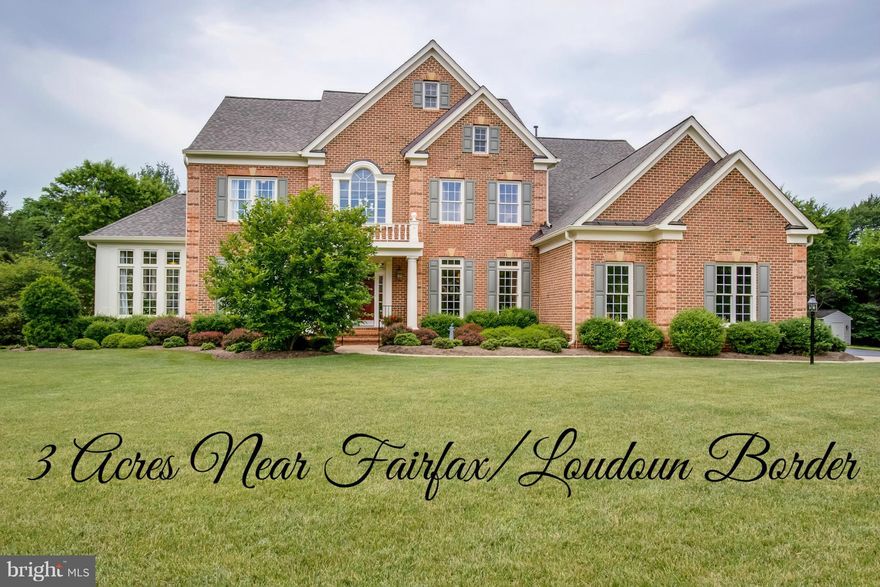 Estate on 3.33 acres near Fairfax/Loudoun line. Hardwds & 10' ceilings, Kit w/ Subzero, Wolf range w/ Dacor hood & pot filler, Miele Wall ovens! Rear & Side sunrooms, MBR w/ 2 walk-ins, FP & lovely bath.  LL wet bar w/ stunning granite.  Walk-in multi-head shwr & 2nd laundry.  Covered brick patio w/ tongue & groove ceiling, irrigation, prof landscaping, 3-car gar, shed w/ elec. Better than new!