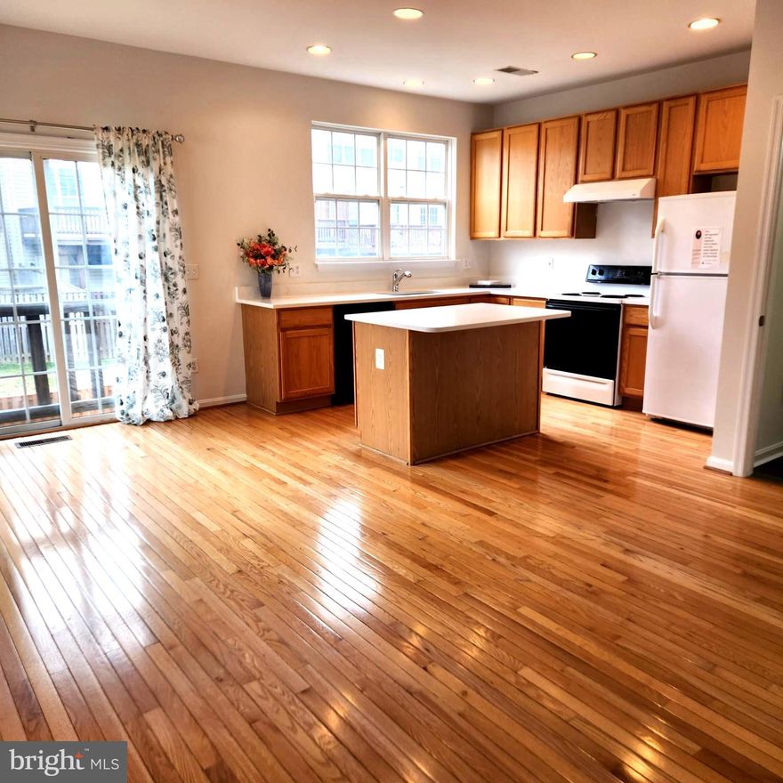 SIGNED A CONTRACT 4/30/25 ... Close 5/30/25
Fabulous End Unit Townhouse complete with a one-car garage for two dedicated parking spaces plus additional parking close by.  This 3-Level home features an inviting walk-in level BONUS ROOM that walks out to a large fenced  backyard space.  This Ground Level BONUS ROOM has a potential Full Bathroom attached as well as the Laundry room.  9' ceilings and hardwood in the 2nd floor kitchen and eat-in dining room.  Adjoining carpeted family room and formal dining space.  3 bedrooms and 2 full baths on the upper level.  JETTED tub in the primary suite bathroom.  The home has fresh paint and new flooring installed.  Close to shopping, schools, entertainment, and major commuting routes.  Montclair Elementary, Hampton Middle, and Garfield High schools.  DON'T MISS OUT ON YOUR 2ND CHANCE TO OWN THIS PROPERTY.