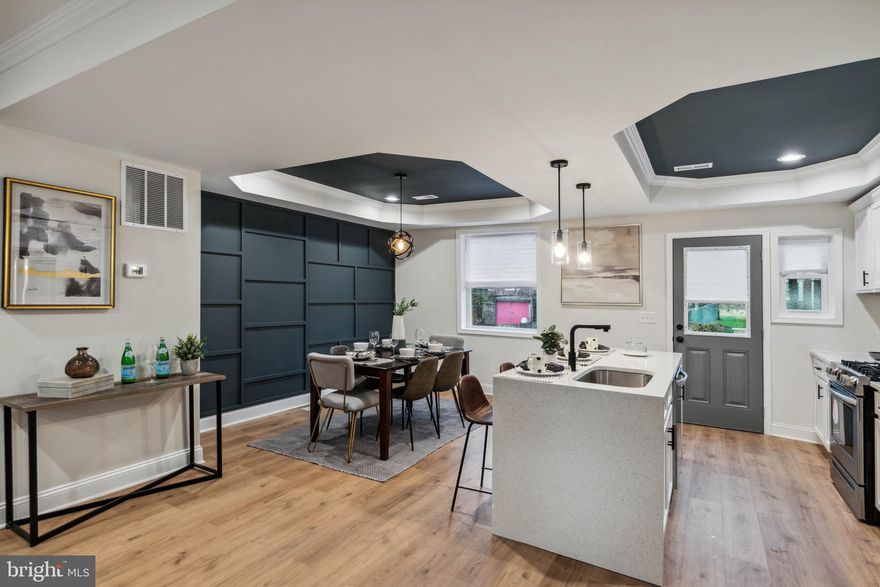 Come check out this charming townhome. Which features 4 bedrooms,2 full bathrooms, Brand new hardwood floors, stainless steel appliances, new Quartz countertops, new fixtures throughout the house, brand new wall to wall carpet and finished basement.