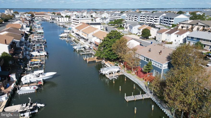 “Imagine waking up each morning to the sound of the water and stepping outside to your own private dock. Welcome to this beautiful canal front townhouse on Newport Bay Drive, 116th Street.”

Discover the perfect blend of comfort and coastal charm in this awesome waterfront townhouse on 116th Street. With your own private boat dock and Jet Ski lift, adventure is just steps away.

Inside, you’ll find 2 spacious bedrooms and 2 full baths, along with a sunroom filled with natural light, a cozy fireplace, and an open deck overlooking the water — perfect for entertaining or relaxing.

The modern kitchen, updated with sleek stainless steel appliances, makes cooking a pleasure.

This home is more than move-in ready — it’s ready for you to step in and start enjoying waterfront life.
"With a private dock, Jet Ski lift, and prime Newport Bay location, this property is more than a home — it’s a smart investment in lifestyle and value."