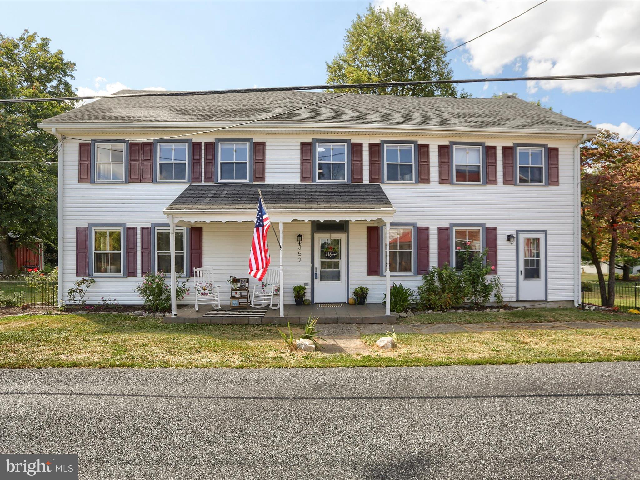 OPEN HOUSE THIS SUNDAY FROM 12-3! Step inside this Beautifully Renovated Log & Frame Home with Timeless Character! This old farmhouse offering 3,751 sq. ft. of thoughtfully updated living space while preserving its rustic charm. Believed to be built originally in 1812 (tax records say 1910). The upper level consists of 4 spacious bedrooms and a full bath, while the main level provides the primary bedroom and newly updated full bathroom with white subway-tiled walls, soaking tub, double vanity and walk in shower.
The warm and welcoming living room features exposed log beams, an open loft, new fireplace and a built-in hutch. A large, sunlit eat-in kitchen with an island, new tile backsplash, SS appliances, built-in corner cabinet and seamlessly connects to the generous dining room with its own antique corner cabinet. Main level also features 2 large walk-in pantry's, a cozy living room/den with fireplace, kids playroom and a convenient craft/ laundry room. Additional highlights include a full attic for storage, two garages, and a workshop—all set on a level one-acre lot perfect for enjoying both indoor and outdoor living.