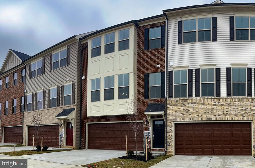 Welcome to this newly built Patuxent floorplan at 16609 Aruba Drive, located at our new Manning Square Towns community in Accokeek, Maryland. 

Step up to this home and you'll be welcomed by a brick front exterior, two‑story bay window, and a welcoming front entry canopy. Inside, a finished lower level recreation room with an additional full bathroom greet you. Stepping up to the next level, you can experience the open layout that provides ample space, perfect for everyday living and entertaining. The great room features an electric fireplace built into the wall, great for enjoying cozy evenings in with your family. The kitchen includes stone countertops, a stainless steel appliances, and pendant lighting over an expansive island.

 Upstairs, the primary suite offers a full en-suite bathroom with included walk-in closets. The upper level is completed by two additional bedrooms and one additional full bath. With premium flooring, oak stairs, and energy‑efficient features, this home delivers exceptional value and appeal in the desirable Manning Square Towns community.
Interior photos are of a similar plan and are for representation only - Contact Caruso Homes for more information.