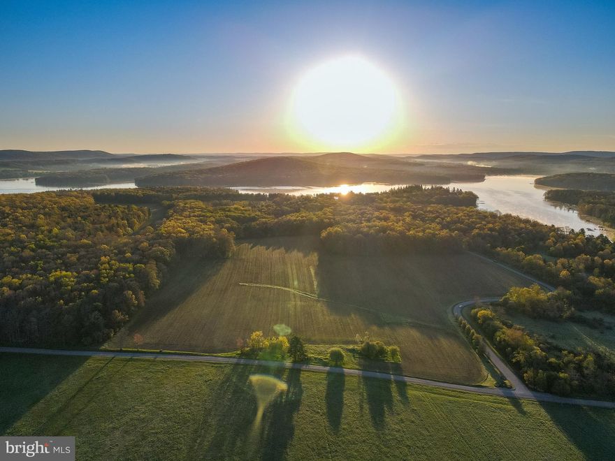 INCREDIBLE opportunity to own one of the last remaining HUGE waterfront properties in the heart of Deep Creek Lake! It's never been available for purchase but NOW it is! 

This property is 241 acres of prime, flat, subdividable land with 1600 feet of waterfront next to the Holy Cross and Blakeslee Communities (this was the original property of both).  

Rich in history, this land is currently being farmed and could easily be subdivided with multiple homes built on the property or be a STUNNING property for one owner who'd love lake access and an abundance of privacy! 

So many options...don't wait! It won't last!