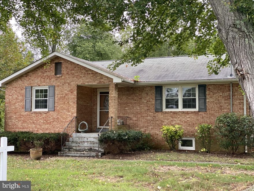 Charming 1966 Brick Rambler with a spacious finished basement, perfect for relaxing or entertaining! The kitchen was beautifully remodeled in 2010, while the basement, full bath, and sunroom received updates in 2007. The tiled basement bathroom offers both a tub and shower for your convenience. The home boasts original hardwood floors on the upper level, adding to its timeless charm. Step outside and enjoy the expansive yard – ideal for gardening, playing, or simply unwinding. A two-car garage/building provides ample space to store all your toys. Located just around the corner from shopping and dining, this home offers the perfect blend of comfort and convenience