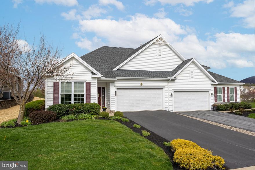 Canceled Open Houses . "Live the Good Life" is the slogan for the Award Winning 55+ Active Adult Community, Liberty Hill, and this lovely home is ready for you to move right in and do that!  It rests on one of the nicest lots in the neighborhood on a cul-de-sac backing to green space offering splendid views and privacy. This freshly painted 3 bedroom home has 2 bedrooms and 2 full baths on the main floor, plus an additional bedroom and full bath upstairs. The main floor also has a nice-sized kitchen with tasteful colors, a dining room/family room area with new carpeting, and a beautiful, bright sunroom that exits to the private deck with awning. The laundry room is also on the main floor. Upstairs, in addition to the bedroom and full bathroom, there is a spacious open room area and an unfinished storage area as well.  The 2 car garage has an extra alcove for storage. This home is also close to all the wonderful amenities afforded to Liberty Hill residents which include a fitness room, tennis courts, an inground pool, a gorgeous clubhouse and walking paths with idyllic mountain views.  These 3 bedroom homes do not come on the market very often, so make your appointment to see this property today. Seller is a licensed real estate agent in PA.