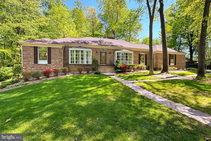 Welcome to this terrific rambler situated in a very private setting on a cul-de-sac, in a convenient location close to great shopping, dining, entertaining, commuting and schools.
A brick walkway leads you past some lovely landscaping to the front door where you are greeted by a beautiful tile entryway.  A formal living/dining room exhibits exquisite hardwood floors, a dual sided gas fireplace with brick surround, and a unique and fabulous bow window.
A gourmet kitchen with hardwood cabinetry and granite countertops is spacious and has an informal dining nook that leads into the mud room.  Here you will find a secluded full bathroom and access to the superb 2 car garage.  Adjacent to the kitchen is the informal family room (currently being used as a formal dining room), that mirrors the same accents as the front living room, in addition to a beautiful and bright wall of sliding doors that leads to the delightful patio and fully fenced rear side of the home.
Back inside, you will find 3 sunny bedrooms, each with plush carpeting and great closet space, that share the beautifully updated hallway bathroom.  The primary suite has hardwood floors and a spa-like ensuite bathroom, complete with soaking tub, walk in shower and dual vanities.  
The lower level of the home provides a huge and very versatile space that would make an ideal playroom, home gym, recreation room, etc.  A large walk-out storage room completes this level. 
If you're looking for meticulously maintained and lovingly cared for on one level in a great spot, you've found it and welcome home!

Minutes to the Burke VRE, GMU, University Mall and Braddock Road.
Roof - 1999, HVAC - 2010, Hot water heater - 2008