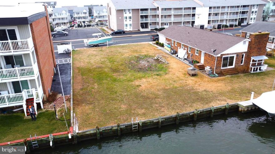 DEVELOPER/ BUILDER OPPORTUNITY !! Rare find in Ocean City! This is the only waterfront lot zoned R-2 found within the Town of Ocean City currently on the market.  A  bulkheaded, canal front, vacant lot with easy direct access to the Bay.  Zoning allows the construction of 3 townhouses  or your dream home.  This lot is located in the very desirable and convenient Little Salisbury neighborhood. Seller has schematic plans for 3 townhouses that they will share.