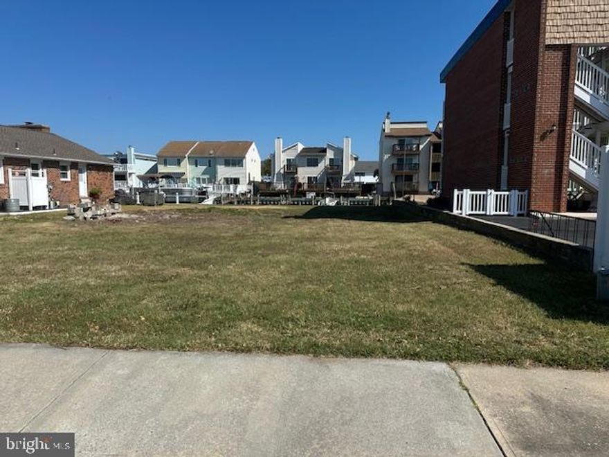 DEVELOPER/ BUILDER OPPORTUNITY !! Rare find in Ocean City! This is the only waterfront lot zoned R-2 found within the Town of Ocean City currently on the market.  A  bulkheaded, canal front, vacant lot with easy direct access to the Bay.  Zoning allows the construction of 3 townhouses  or your dream home.  This lot is located in the very desirable and convenient Little Salisbury neighborhood. Seller has schematic plans for 3 townhouses that they will share.