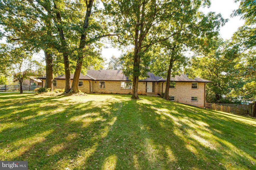 Absolutely gorgeous home with 4 bedrooms and 2 full baths on an acre with a finished walkout basement in a great location. All one level living with Master Bedroom on the main level. There is a beautiful yard with a deck and is fenced and ready to move in. This home is a must see!