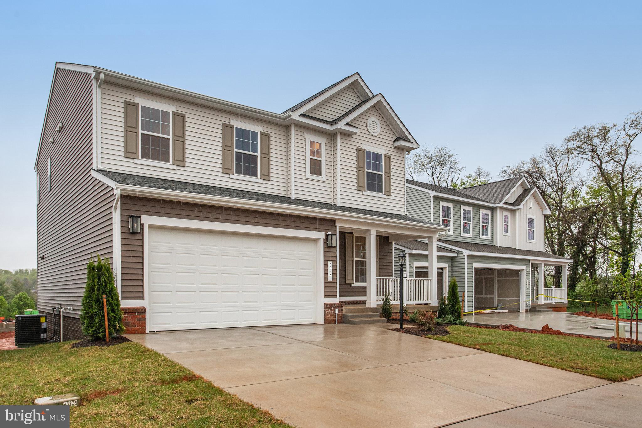 ASK ABOUT SPECIAL FINANCING! $0 down payment USDA financing eligible! This Lapis by Richmond American Homes is move-in ready now!! There's a lot to love about the Lapis floor plan! The charming front porch leads to an inviting, open layout. Walking through the front door to the right is an adaptable flex room and elegant open stairs and beyond that is the main living space. The kitchen with a center island and large walk-in pantry flows into a dining room and a great room, completed by a center-meet sliding door – leading to your 29x10 covered Deck. Upstairs, the primary suite offers a full private bath and a generously sized walk-in closet. Adjacent are three additional bedrooms. Curated finishes round out this home such as Blanco Maple quartz countertops, Aristokraft White cabinets, 7” Kenwood LVP floors on the main level, and sleek matte black light and plumbing fixtures. There is more room for storage or future living space in the large, walk-out style basement. Welcome to Round Hill Meadows in Orange! Residents will appreciate the small-town charm as well as the conveniences of being close to routes 15, 522 and 3, award-winning wineries, Lake Anna State Park, Lake Orange and the Rapidan River nearby for fishing, swimming, kayaking and boating! Model is OPEN but visitors are encouraged to call ahead to be guaranteed a dedicated appointment.