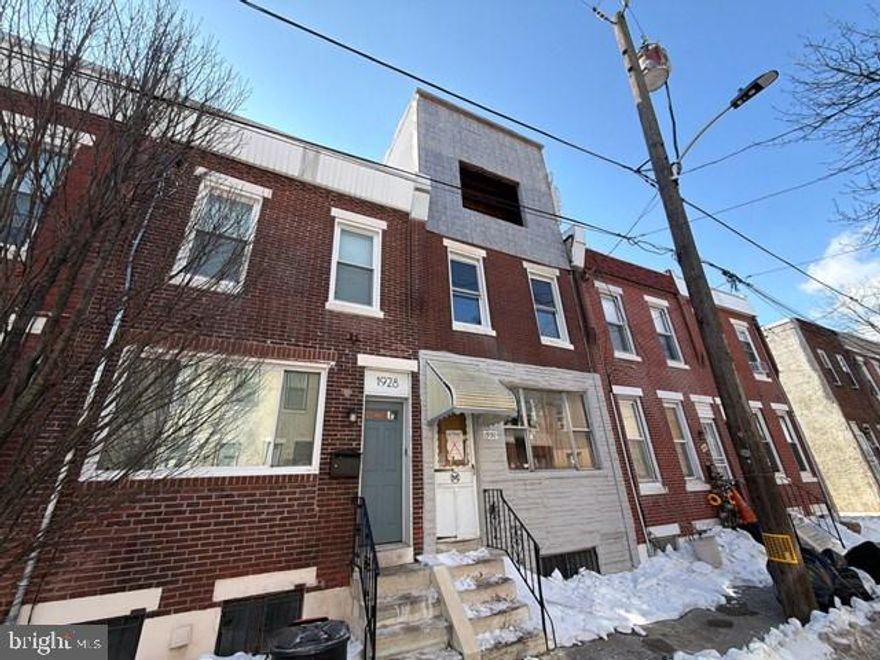 Located in the heart of South Philadelphia, 1930 Hoffman St. presents a rare opportunity for investors or builders ready to bring a partially completed renovation across the finish line. This shell property has already undergone significant improvements, including a third-floor addition with rooftop deck, new interior framing, rough electrical and plumbing, new HVAC ductwork with condenser and furnace, two new bathrooms, partial window replacement, and updated exterior siding on three sides. Approved plans are in place and transferable to the new owner, providing a strong foundation for completing the project and maximizing value. Surrounded by ongoing redevelopment and strong resale activity, this property offers excellent upside for those looking to customize and capitalize in a highly desirable South Philly location.