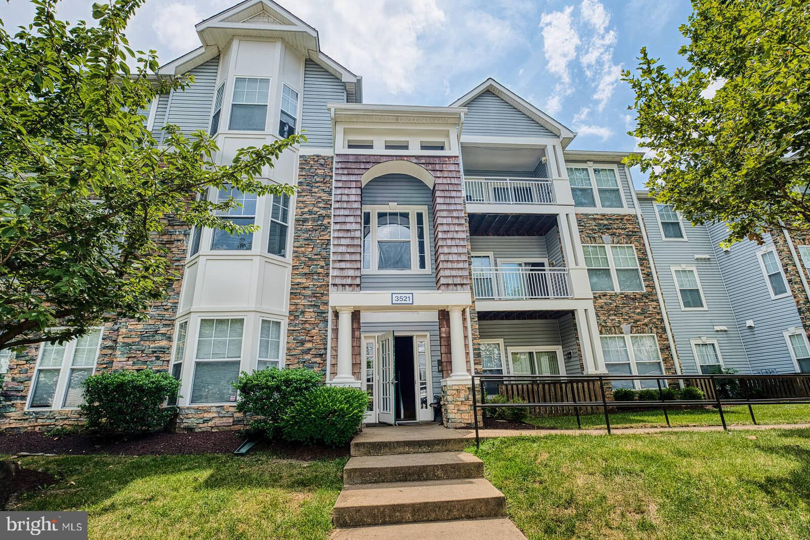 Location, Location, Location!! You are minutes from BW Parkway, bakeries, grocery stores, restaurants, shopping and so much more. This two bedroom condo is designed roommate style with one primary bedroom and bathroom on the top level; no one above you. Bedrooms are carpeted and all main living area have LVP flooring . Spacious living areas featuring an island where you can place two to three stools. The laundry room is in the kitchen area. You can access the balcony from the living room....overlooking the wooded back area which offers some privacy. You don't want to miss this gem. Perfect for a first time home buyer or an investor.