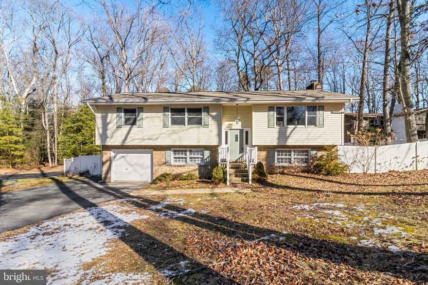 Welcome Home to 23560 Gross Dr, California, MD 20619 - Your Perfect Split Foyer Retreat!
Discover the comfort and style in this meticulously crafted split foyer home, offering 5 bedrooms and 3 bathrooms. Nestled on a generous .52-acre lot, 23560 Gross Dr is more than a residence; it's an invitation to luxurious living in the heart of California, MD.

As you step inside, be greeted by the warm embrace of hardwood floors throughout, creating an inviting atmosphere. The heart of the home lies in the spacious and updated kitchen, where culinary dreams come to life. This kitchen offers ample counter space, storage and a thoughtful layout making this kitchen a haven for both chefs, and families who like to entertain.
This home offers a spacious deck, surrounded by a privacy fence that adds an extra layer of seclusion to your outdoor gatherings. Whether hosting a barbecue or enjoying a quiet evening under the stars, this space is designed for making lasting memories.

Convenience meets serenity in this prime location. Your new home is conveniently situated near the water, providing a refreshing coastal breeze. Explore the natural beauty of Myrtle Point State Park, just moments away, or head to PAX for work or leisure. The surrounding area also offers a plethora of dining and shopping options, ensuring you have everything you need within reach.

Don't miss the opportunity to make 23560 Gross Dr your forever home. Schedule a private showing today and discover the unparalleled comfort and style that awaits you in this California, MD gem. Your dream lifestyle begins here!