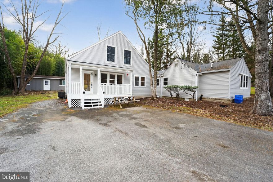 A rare gem in the quiet countryside! Just minutes from Sugarloaf Mountain, local vineyards, and Little Bennett Regional Park, this fully renovated home offers a peaceful retreat on a scenic half-acre lot.

Designed for easy main-level living, the home features three spacious bedrooms and three beautifully updated full baths. Gleaming hardwood floors extend throughout both levels, highlighted by a striking spiral staircase that leads to a loft and private deck overlooking a serene koi pond with waterfalls.

The modern kitchen boasts quartz countertops, stainless steel appliances, and ample cabinetry. A finished studio outbuilding with pine interior provides the perfect space for a creative studio, yoga room, or guest retreat.

Enjoy nearby hiking trails, the Clarksburg Premium Outlets, and convenient commuter access via major routes and the MARC station at Barnesville (within 5 miles). Experience the perfect blend of country tranquility and modern comfort — a true sanctuary to relax and recharge.