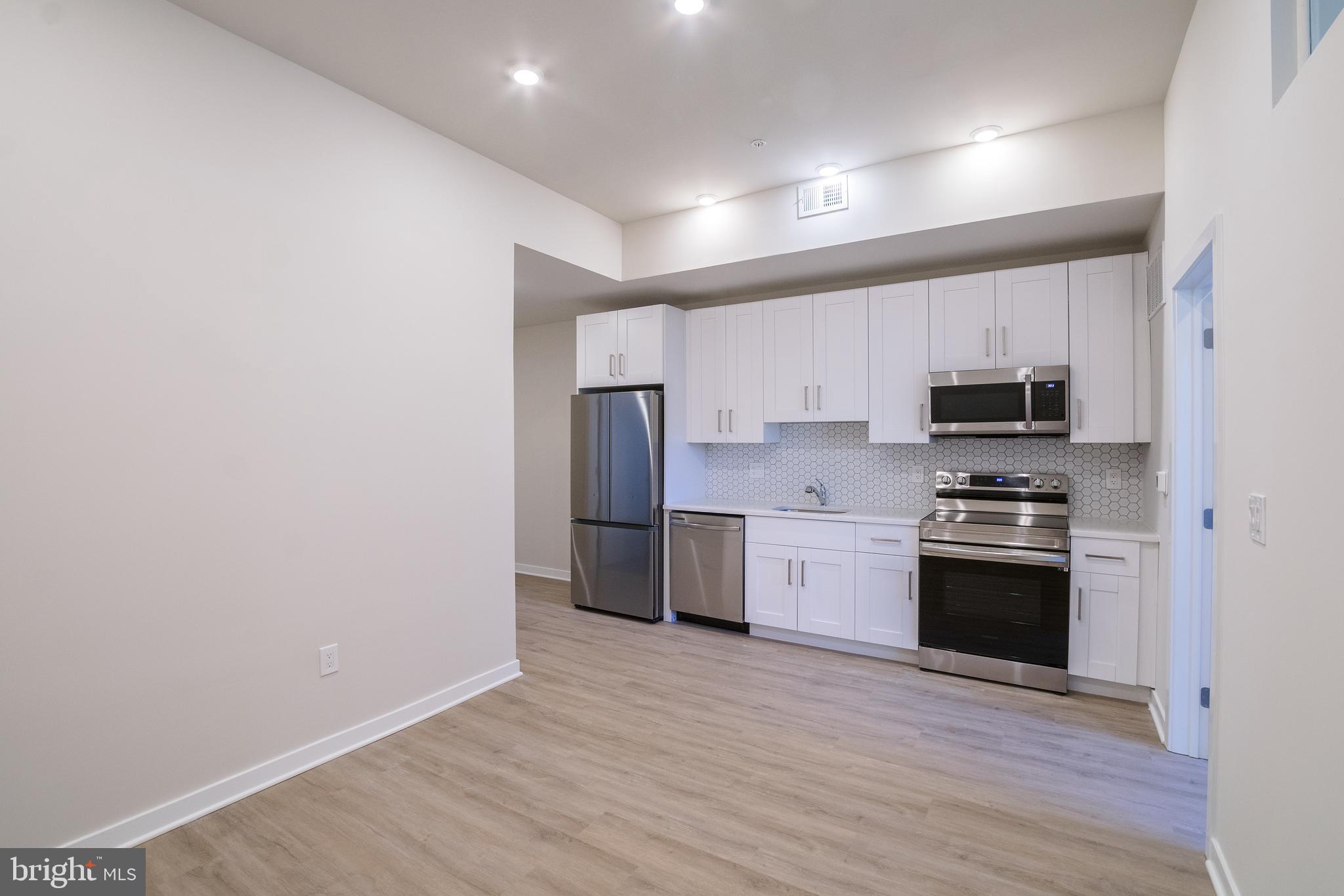 *Available NOW!*
Welcome to Patton Place, a brand new 42-unit apartment complex in Grays Ferry with a landscaped front courtyard, an expansive shared roof deck, shared bike storage, and secure gated entry. This 1 bed, 1 bath apartment has been thoughtfully designed with hardwood flooring, in-unit laundry, central air conditioning, and modern fixtures. The bright, contemporary kitchen includes stylish honeycomb backsplash tiling, brand new Samsung stainless steel appliances, and plenty of cabinet space. The full bath comes fit with a contrasting black tiled shower/tub and a traditional vanity with drawers for storage. Finally, the spacious bedroom has its own closet and ample natural light thanks to many windows. You are sure to enjoy being in close proximity to outdoor recreational areas like Stinger Park and D Finnegan Playground. Numerous shops are located nearby on Grays Ferry Avenue, including a Fresh Grocer and a Fine Wine and Good Spirits. An entrance to I-76 is just a couple blocks away, and multiple public transportation routes sit nearby, providing easy access to West Philadelphia and Center City.
Lease Terms: Generally, 1st month, and 1 month security deposit due at, or prior to, lease signing. Other terms may be required by Landlord such as last month's rent upfront. $65 application fee per applicant. Tenants are responsible for: electricity, gas (if applicable), cable/internet and $10/mo technology fee. Water is a flat monthly fee of $60. Additional fees or requirements may be applicable for units with Homeowners or Condo Associations. Landlord Requirements: Applicants to make 3x the monthly rent in verifiable gross income, credit history to be considered, no evictions within the past 5 years, and must have a verifiable rental history with on-time rental payments. Exceptions to this criteria may exist under the law and will be considered. Cosigners will be considered.
*Sorry, no pets
*Price reflects the net effective rent after a 1-month credit is applied at $1,300/mo.
*$500 security deposit required
*The building is set back from the street. Access the complex via the 3100 block of Reed Street