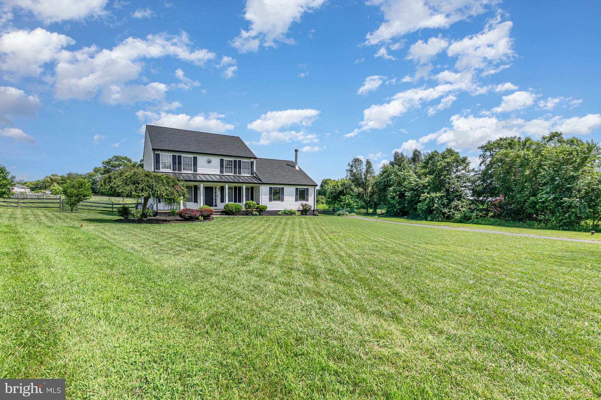 The Rising Sun farmette you've been waiting for! The perfect mix of home, land, fencing, and outbuildings. 4.3 acres nestled on a cul de sac featuring an updated modern decor 4 Bedroom 2.5 Bath Colonial, Stylish 3000 square foot Garage/Barn/Workshop, a 2 Bay Run In Shed, Pastures, Play Area, and Zipline. Pole Barn boasts 2 Large Stalls, Saddle Room, Storage Room, Loft, Air Conditioned Workshop, Full Lenth Lein To, Concrete Pad, and Full Height Door. Inside the home you'll definitly enjoy the updated Gourmet Kitchen/Dining Area overlooking the pastures, huge Great Room, and Primary Bath Soaking Tub. As an added bonus all the Solar Panels are owned reducing cost to just delivery charges most months! Rising Sun School District properties don't last long!