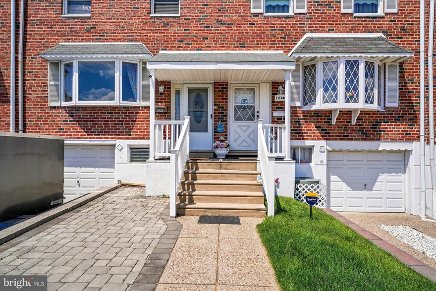 Located in the desirable Parkwood neighborhood of Northeast Philadelphia, this well-maintained home offers a light-filled, open floorplan.  A spacious family room is met upon entering the home leading to a sun-drenched kitchen complete with stainless steel appliances including a Bosch dishwasher and built-in microwave.  The adjacent dining area is amply sized for sit-down meals.  Upstairs includes 3 full bedrooms and 1 full bath. If entertaining is your thing, this home will delight.  A finished basement with a stunning, built-in bar along with 2 levels of outside lounge areas are fantastic for hosting gatherings or enjoying  a day of personal relaxation.  The upper level has Trex decking and an inviting Pergola with an outside TV.  The lower level provides additional space for seating and a firepit while new fencing encloses the area for added privacy.  The home also has a 1-car attached garage with basement access along with a driveway making for convenient parking.  The property is close to area attractions and is in proximity to major roadways for commuting.  A wonderful opportunity awaits to make this your new home!